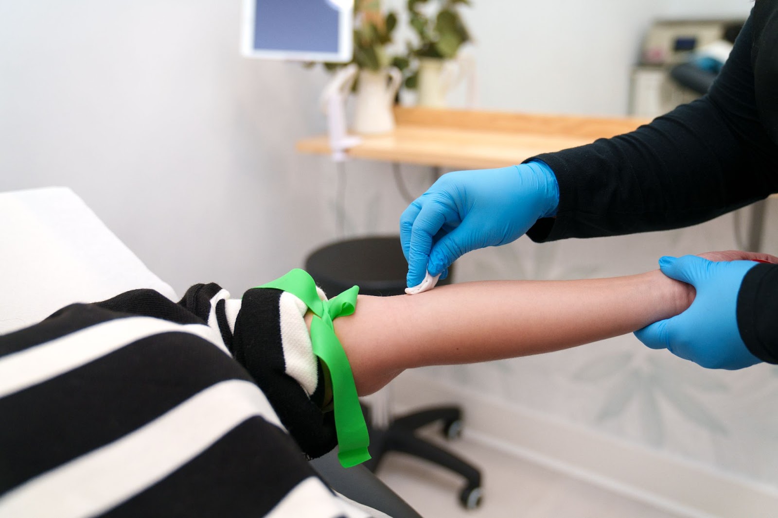 Closeup of arm being prepped for IV therapy